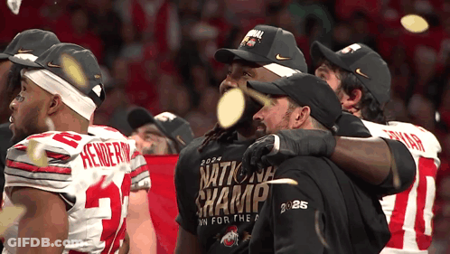Football Players Wearing National Champs Shirts GIF