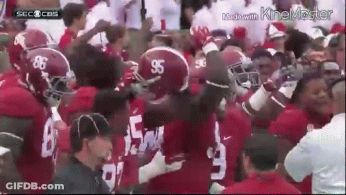 Football Players With Helmets 96 And 95 GIF