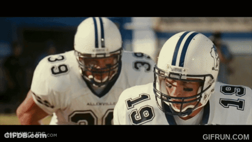 Football Players With Number 18 Helmets GIF