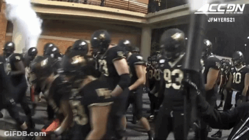 Football Players With Number 93 On Uniforms GIF