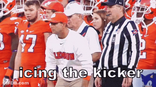 Football Players With Referee Icing The Kicker GIF