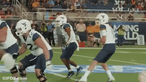 Football Players With Rising World Banner GIF