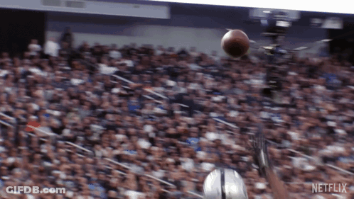 Football Thrown In Stadium With Netflix Logo GIF