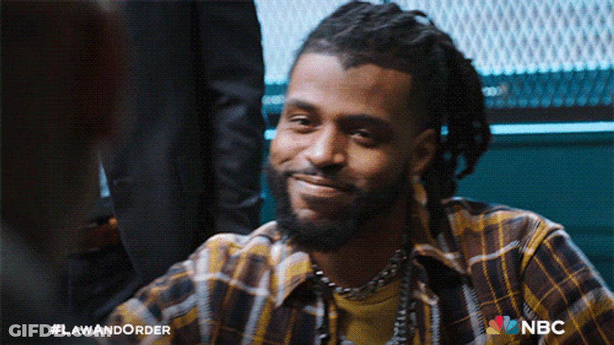Forcing Man To Sit Down GIF