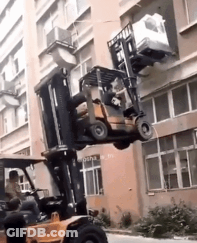 Forklift Lifting Large Object GIF