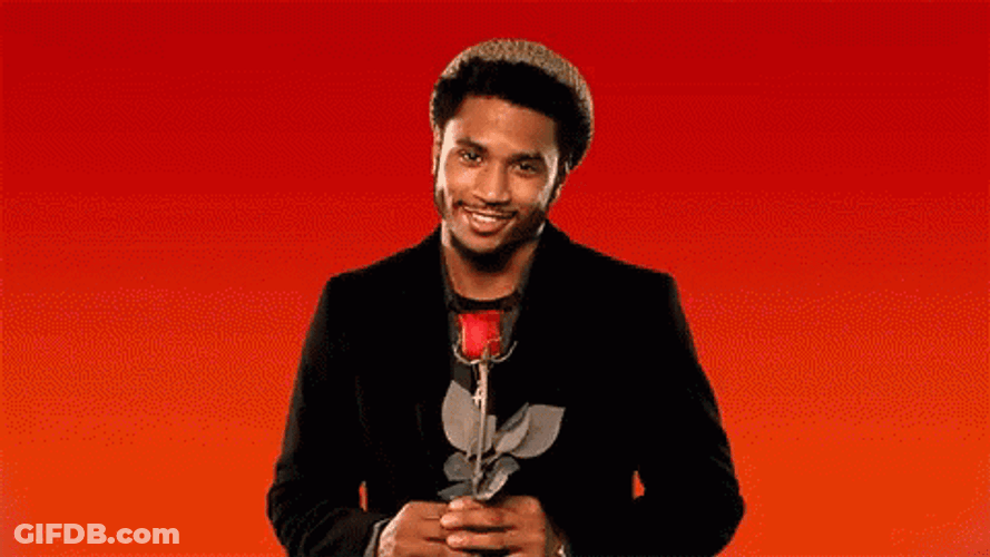 Formal Man Giving Flowers GIF