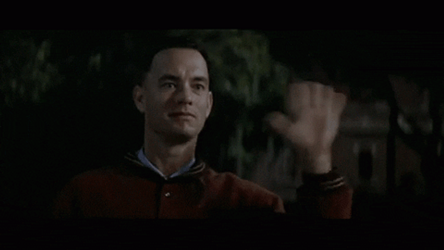Forrest Gump Waving Rapidly GIF