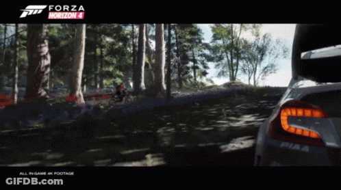 Forza Horizon 4 Man Riding Bike Through Woods GIF