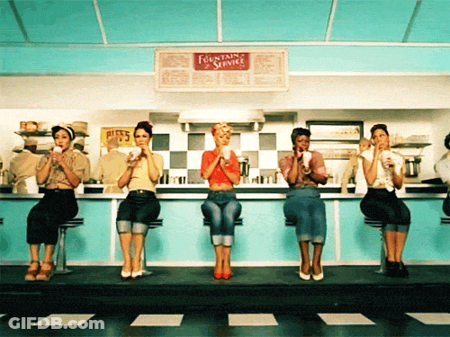Fountain Service Sign Above Women At Counter GIF