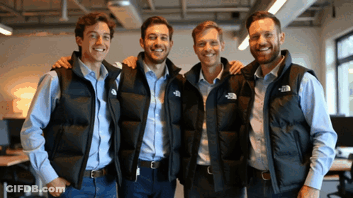 Four Men Wearing Vests With The North Face On Them GIF