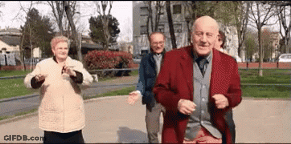 Four Old People Dancing In The Park GIF