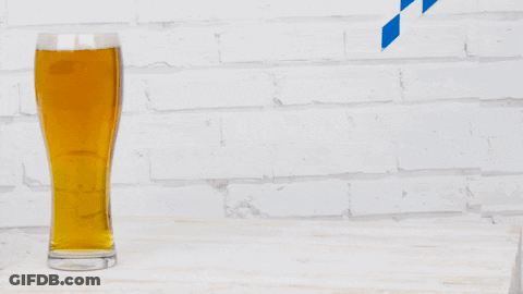Four Tall Glasses Filled With Beer GIF