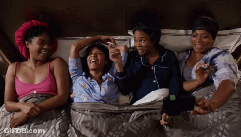 Four Women Laughing And Holding Hands GIF