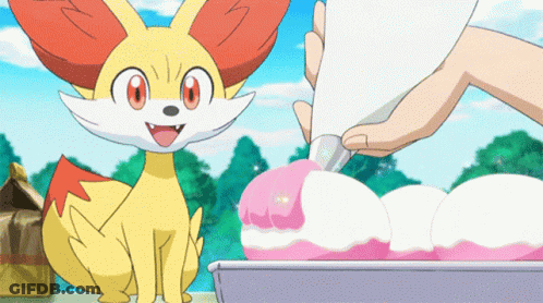 Fox Sitting Next To Person Piping Pink Frosting GIF