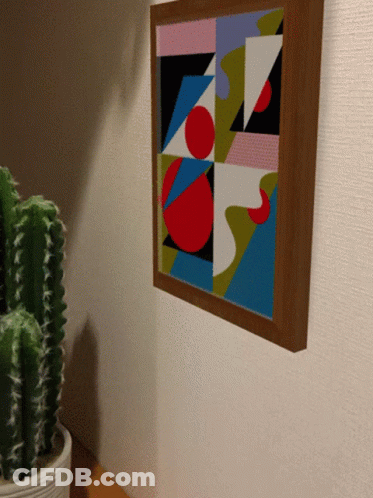Framed Painting With Cactus On Wall GIF