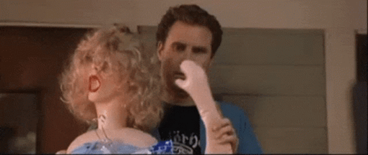 Frank The Tank Waiving With Doll GIF