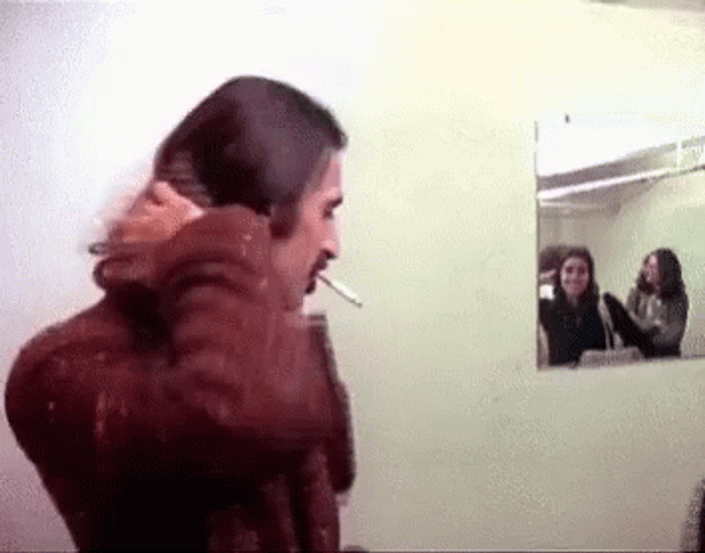 Frank Zappa Fixing Long Hair GIF