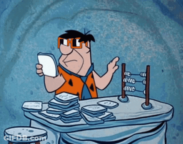Fred Flintstone As An Accountant GIF