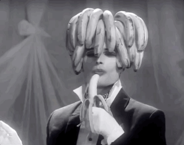 Freddie Mercury Eating Banana GIF