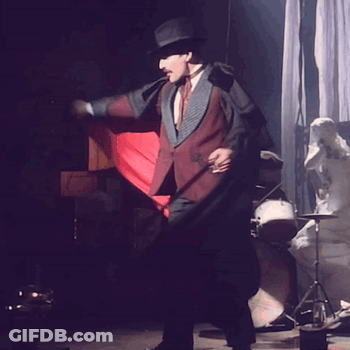 Freddie Mercury Red Cape Magician Attire GIF