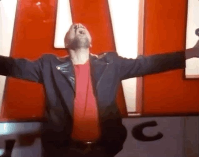 Freddie Mercury Spreading His Arms GIF