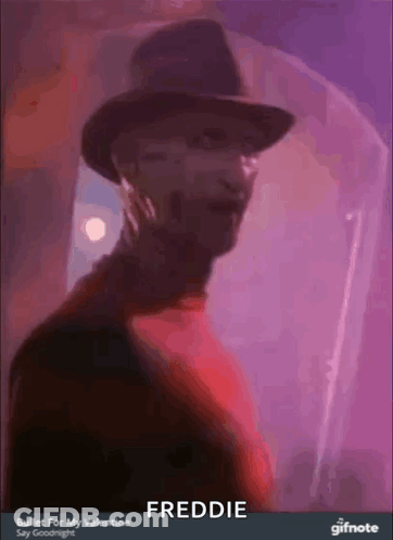 Freddy Krueger From A Nightmare On Elm Street Is Wearing A Hat And A Red Shirt GIF