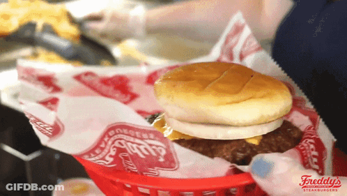 Freddy's Hamburger In Basket With Bun And Cheese GIF