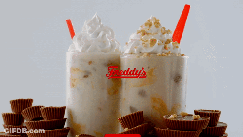 Freddy's Milkshake With Whipped Cream And Peanut Butter Cups GIF