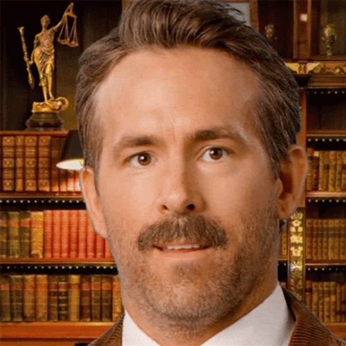 Free Guy Ryan Reynolds Wink GIF