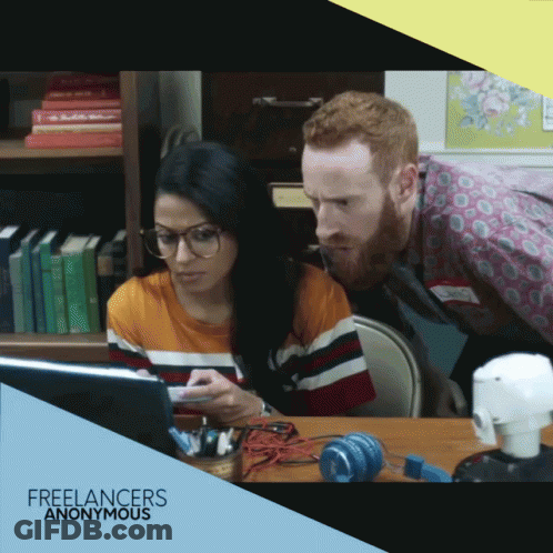 Freelancers Anonymous Ad Man And Woman Looking At Tablet GIF