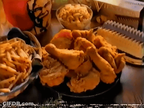Fried Chicken And French Fries On A Table With A Kfc Cup GIF