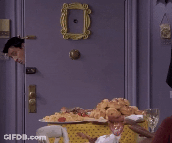 Friends Thanksgiving Joey Peeking At Food GIF