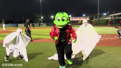 Frog Mascot Walking With Two Ghosts At Night GIF