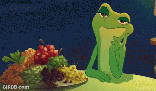 Frog Sitting At Table With Plate Of Fruit GIF