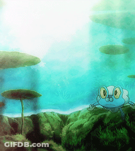 Frog Swimming In Water With Mushroom GIF