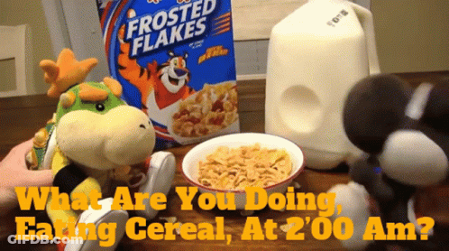 Frosted Flakes Cereal Box Next To Bowl GIF