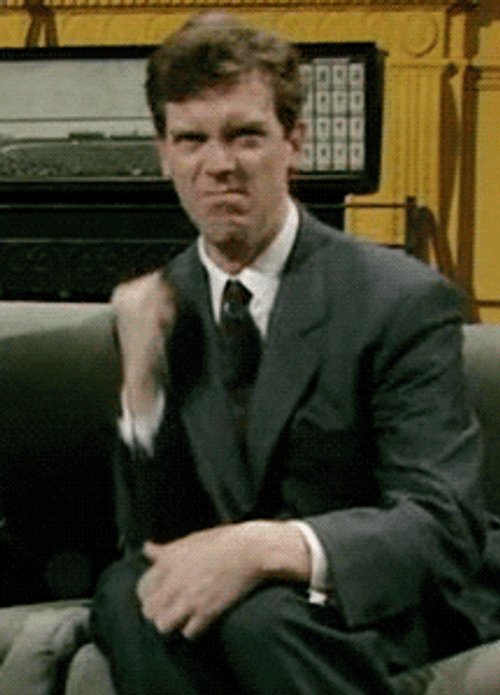 Frowning Hugh Laurie Shake Fist GIF