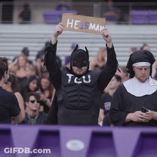 Frustrated Fan Holding Heisman Placard GIF
