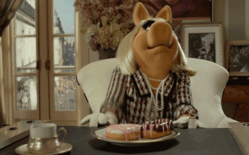 Frustrated Miss Piggy Head Bump GIF