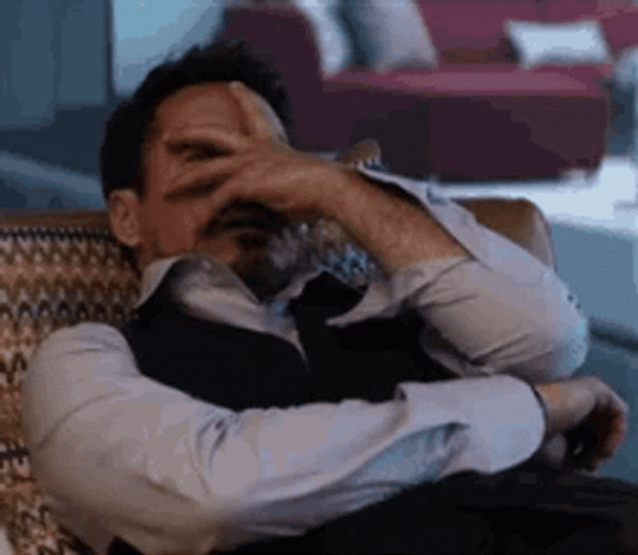 Frustrated Tony Stark Facepalm GIF