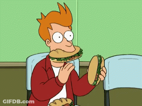 Fry From Futurama Is Eating A Sandwich With His Mouth Open GIF