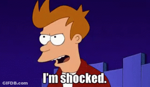 Fry From Futurama Is Shocked While Standing In Front Of A Blue Wall . GIF