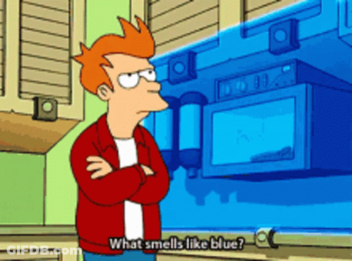 Fry From Futurama Stands In Front Of A Blue Microwave And Says What Smells Like Blue GIF