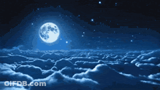 Full Moon Shining Over Cloudy Sky GIF