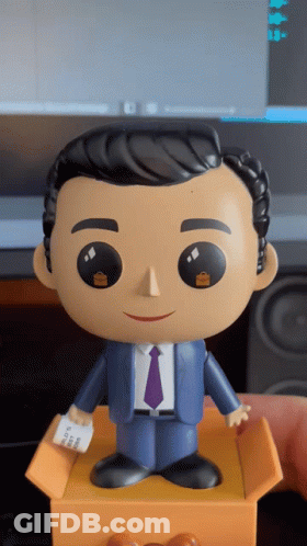 Funko Pop In Suit And Tie Holding Receipt GIF