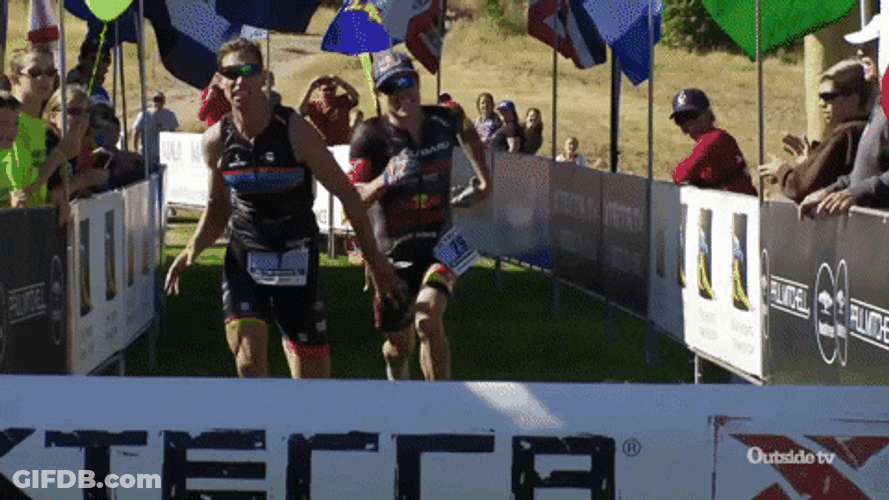 Funny Athlete Sliding To Finish Line GIF