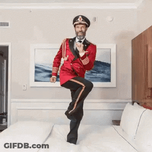 Funny Cruise Captain Dancing On Bed GIF