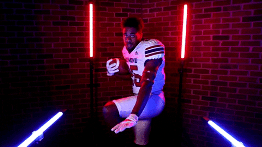 Funny Footballer Striking The Heisman Pose GIF