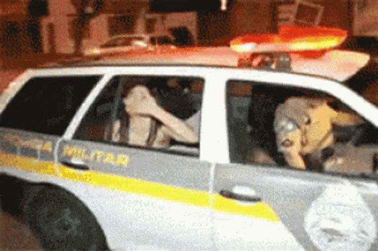 Funny Girl Riding Police Car Waving Goodbye Kiss GIF