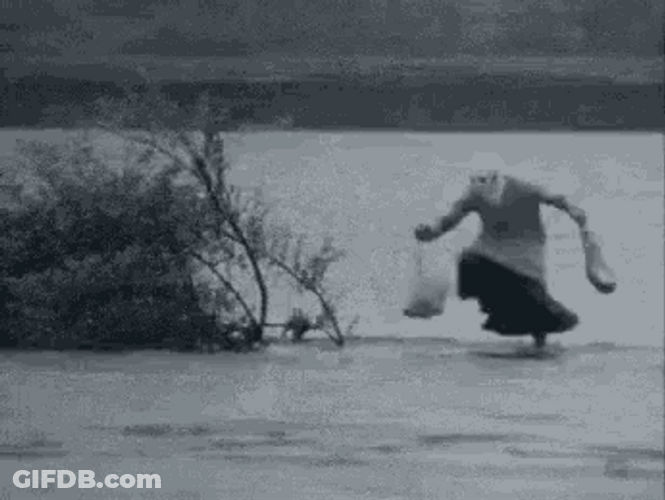 Funny Granny Holding Groceries Dancing In The Rain GIF